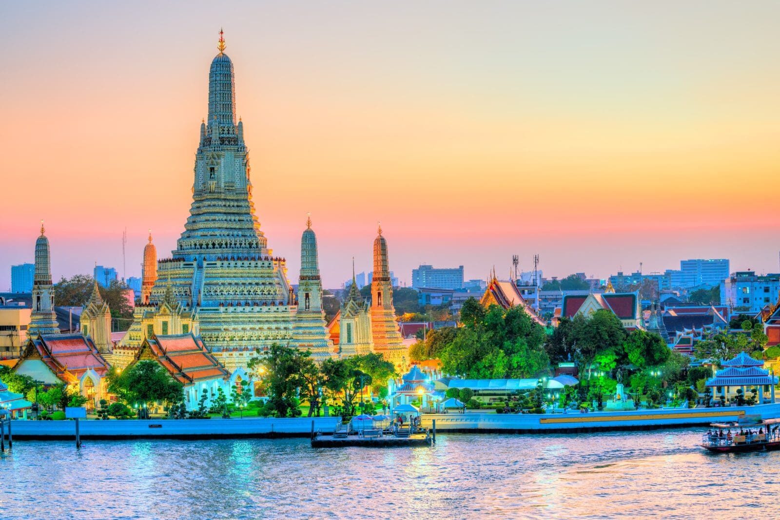Wat Arun at sunset on the Chao Phraya River, Bangkok