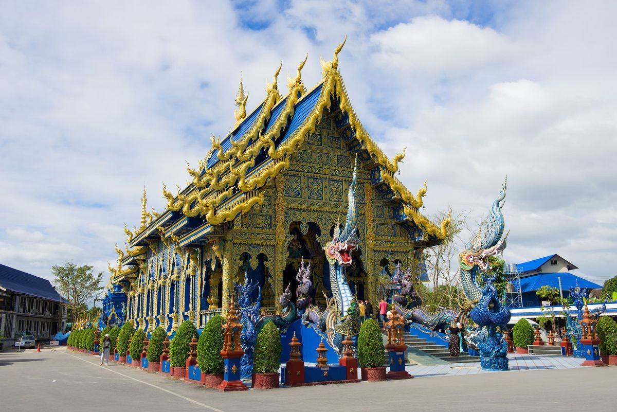 Blue and gold interior of Wat Rong Suea Ten (Blue Temple), Chiang Rai