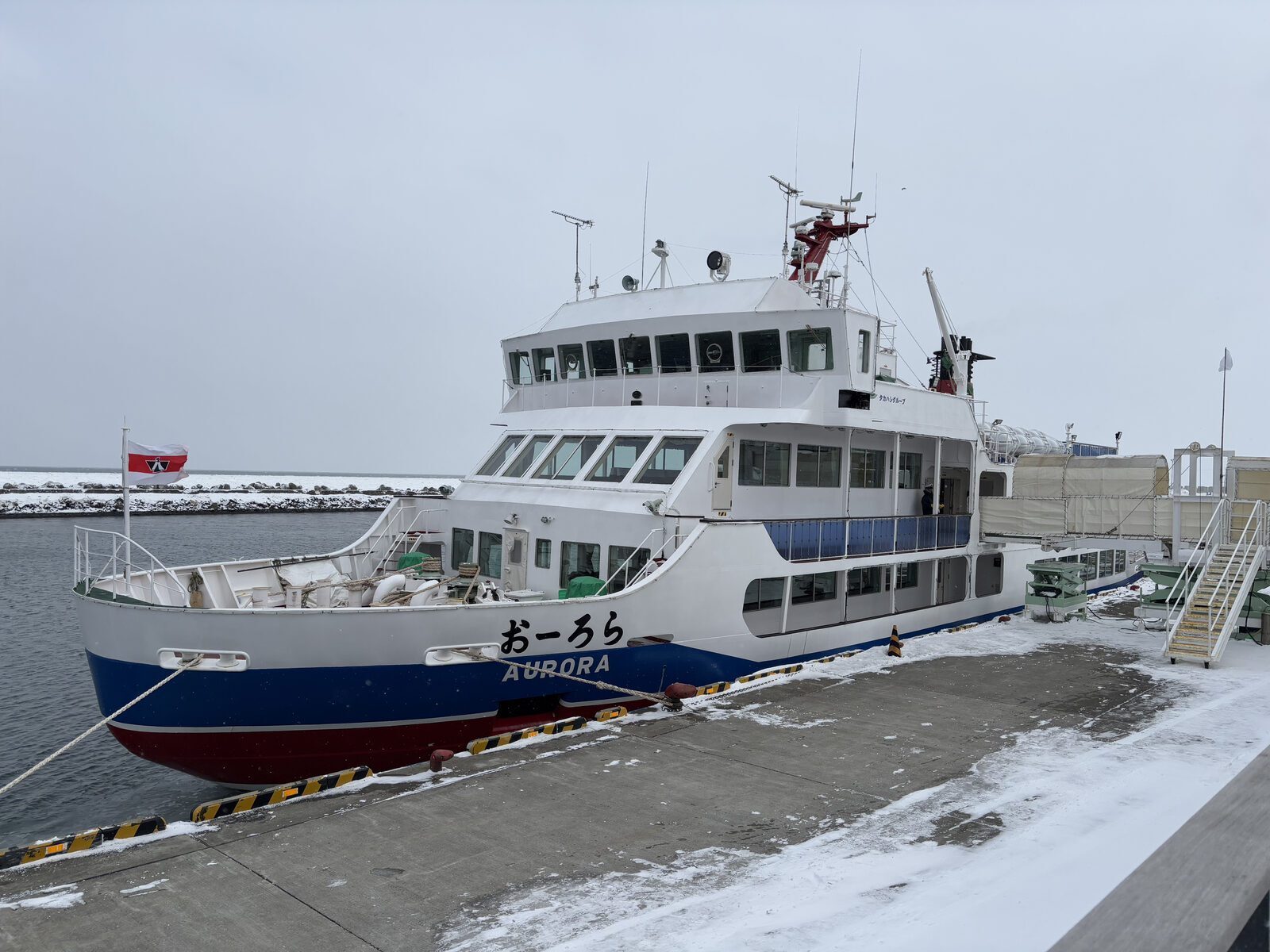 Aurora icebreaker cruise breaking through sea ice off Abashiri