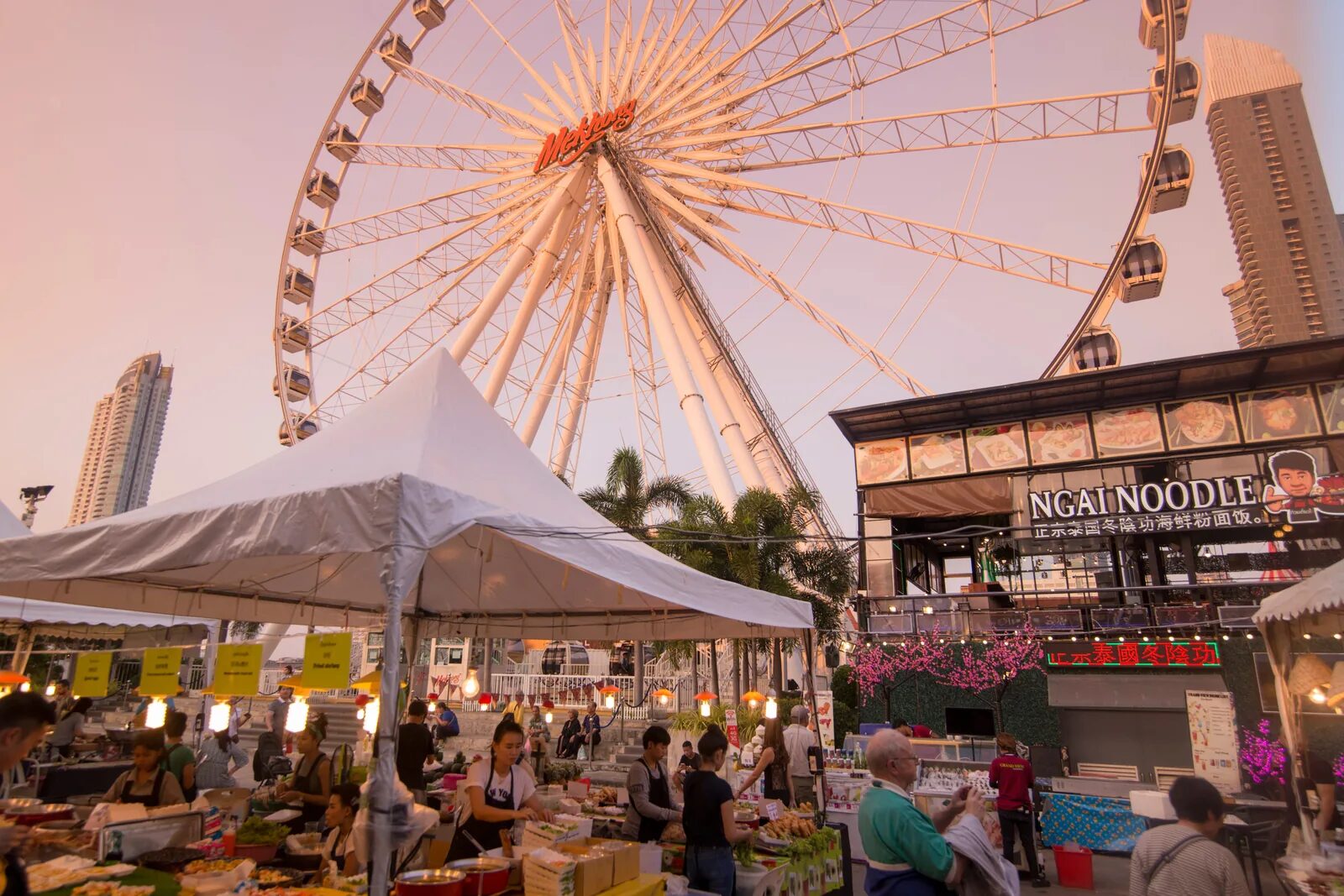 The Ferris wheel and evening stalls at Asiatique The Riverfront night market in Bangkok