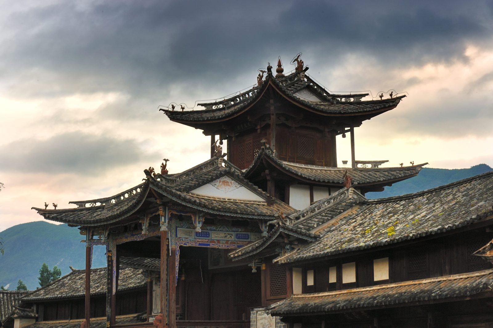 Timber opera stage with tiers of flying eaves in Shaxi Ancient Town