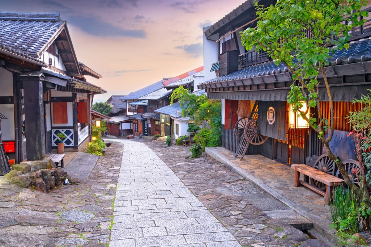 Stone-paved slope and wooden post-town houses at Magome-juku