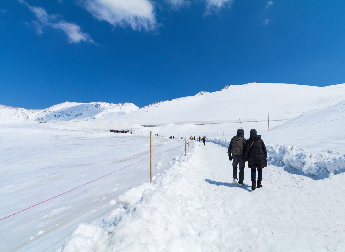 Spring snowfield and walking trail at Murodo on the Tateyama Kurobe Alpine Route